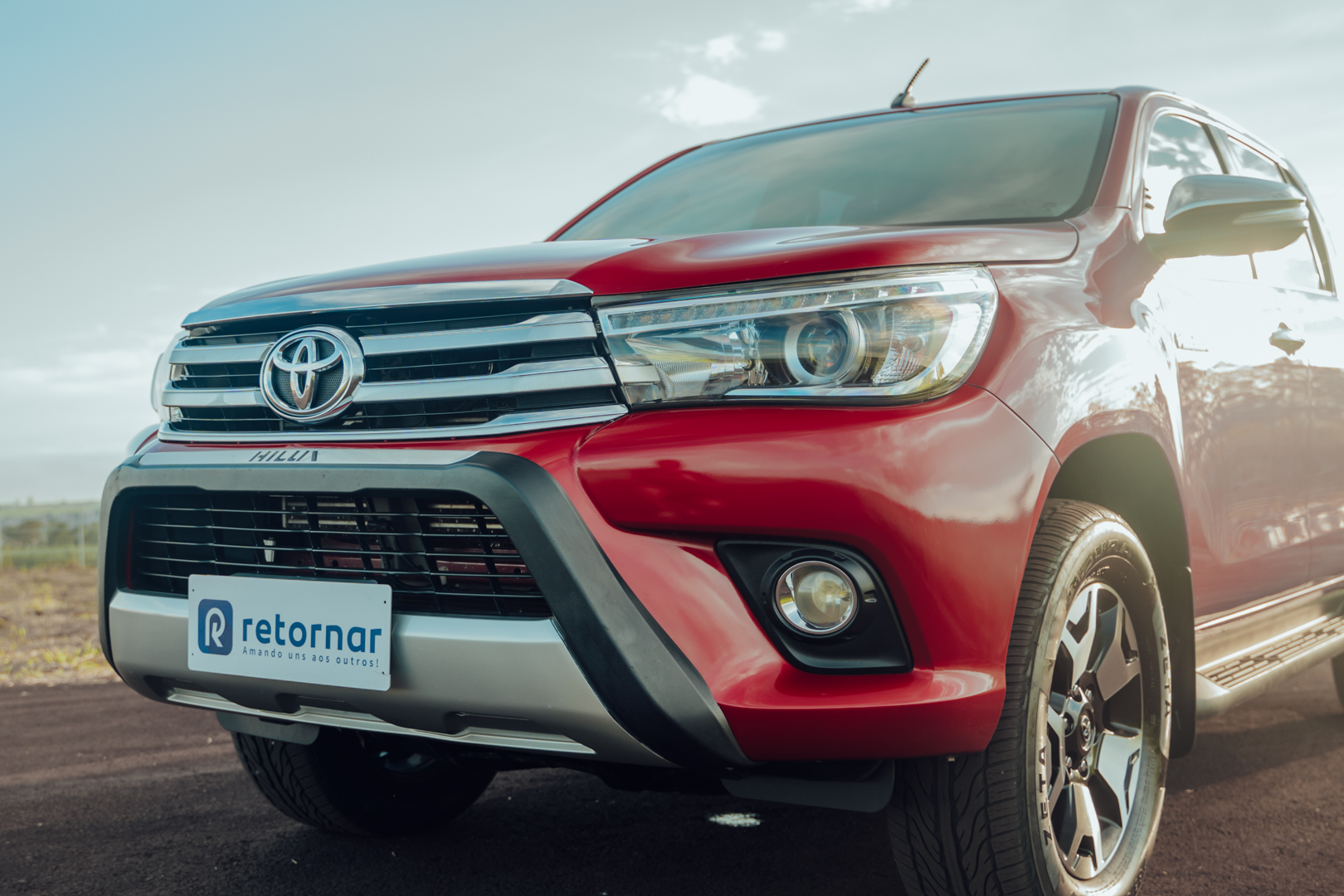  Hilux vermelha 

